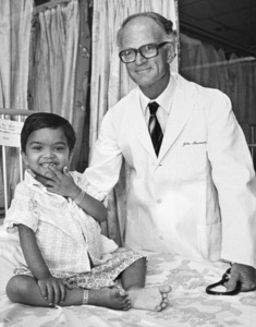John Beveridge with patient.<br>Photo courtesy of Les White, Copyright University of Sydney