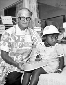John Beveridge with patient. Photo courtesy of Les White, Copyright University of Sydney